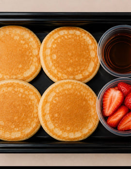 Toddler breakfast meal 1 (6 oz container): Mini Banana Pancakes with a side of strawberries