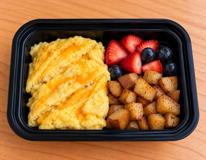 Egg and cheese Omelette with fruit and soft diced potato
