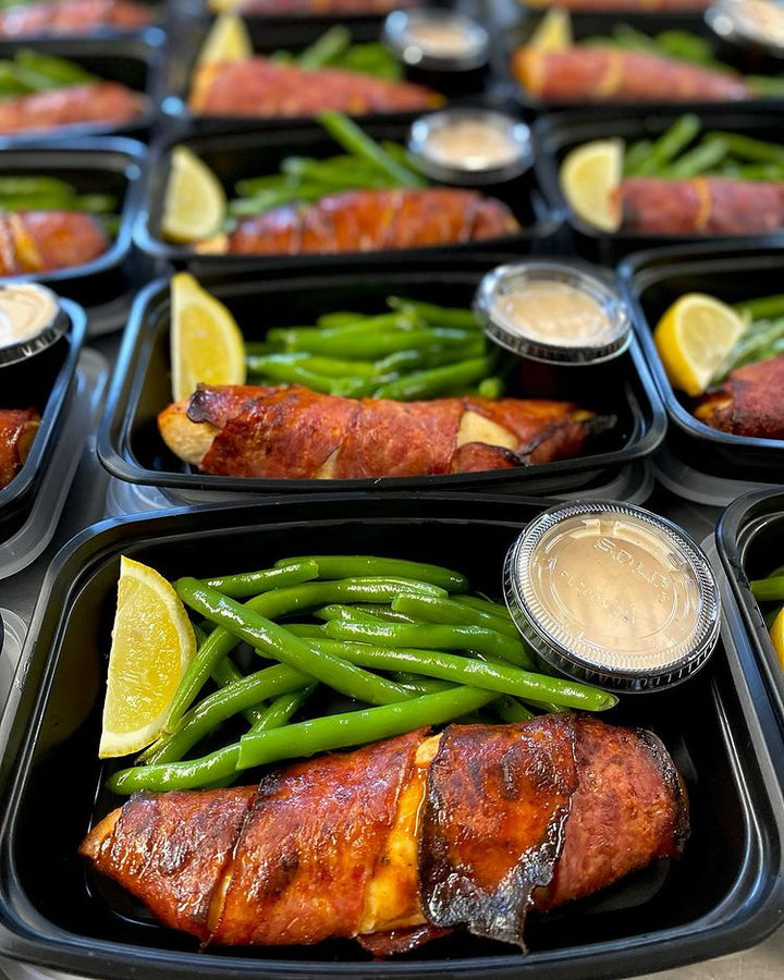 Smoky Turkey Bacon-Wrapped Chicken with green beans and Creamy Garlic Parmesan Sauce on the side
